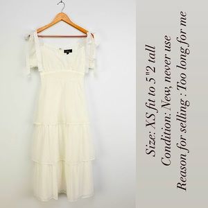 Long flowy white dress.